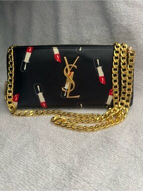 Auth. Yves Saint Laurent lipstick crossbody   zippy around large wallet.